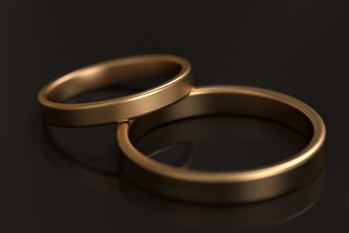 Close-up of gold bars and intricate 1 gram gold jewellery, symbolizing manufacturing and sourcing for 1 gram gold jewellery