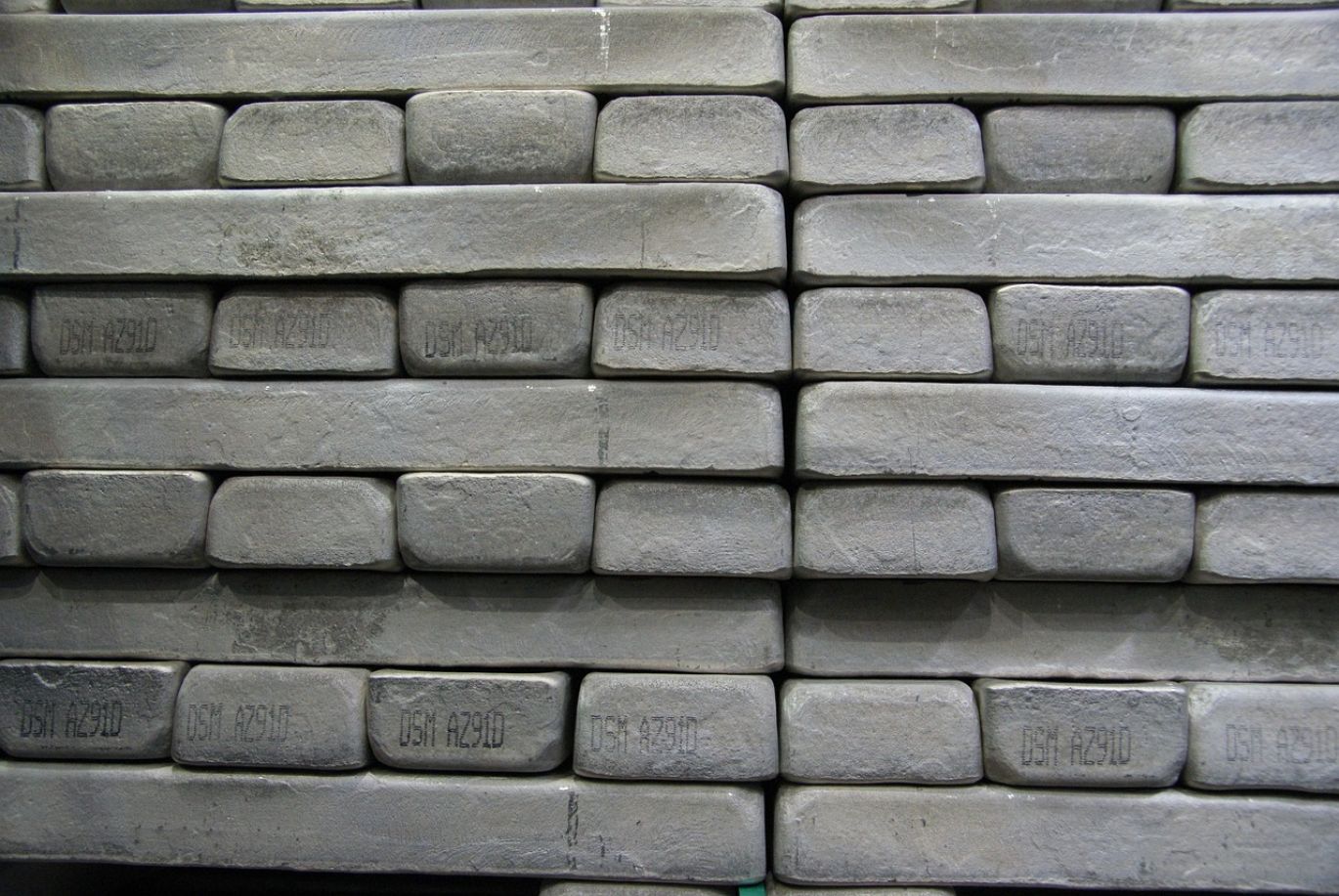 Stack of 5 Oz Silver ingots with Summit Gold Resources logo