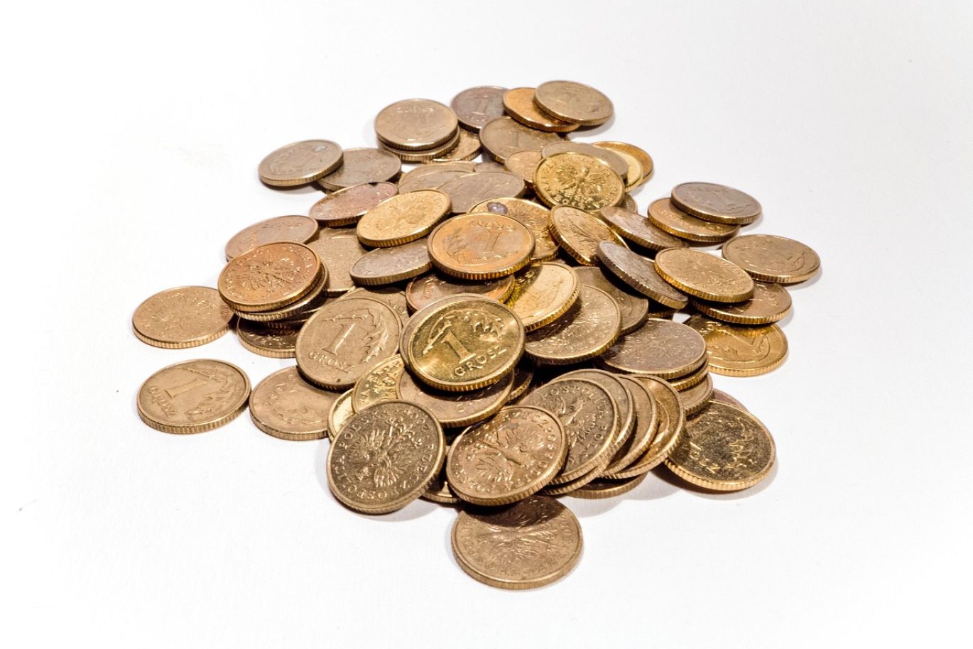 Close-up of shiny gold coins, representing the Best Gold Coins for investment.