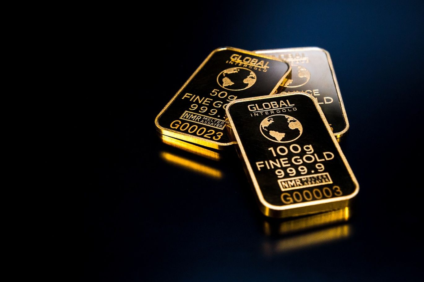 Illustration of gold bars and coins representing Best Gold Ira Companies 2021 investment opportunities.