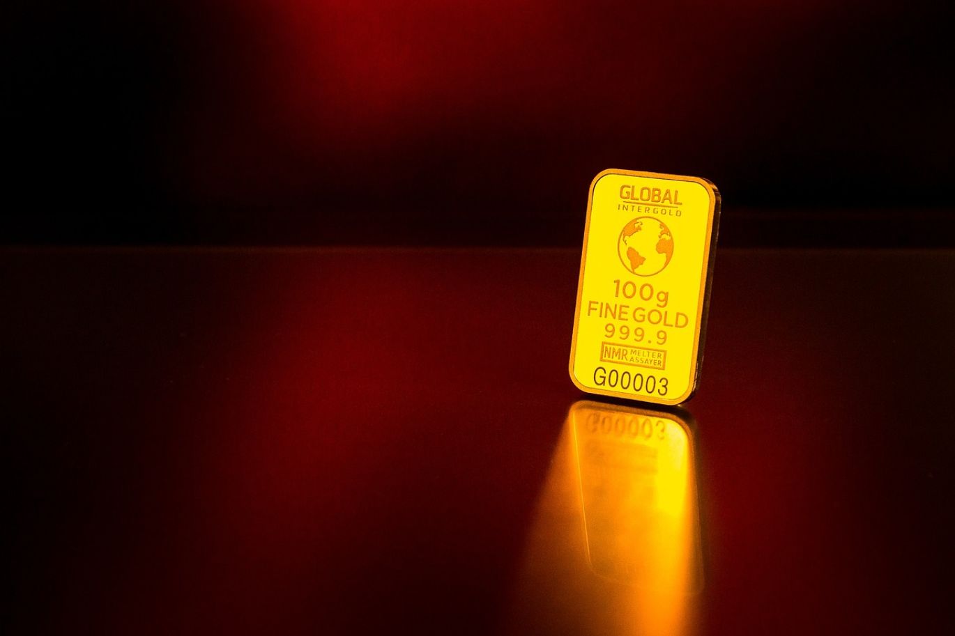 Bullion By - Image of polished precious metals bars, representing commodities trading.