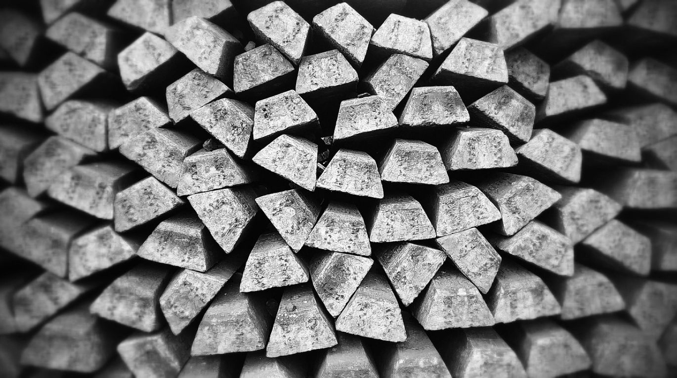 Close-up of shiny palladium bars stacked, representing an investment opportunity and industrial commodity.