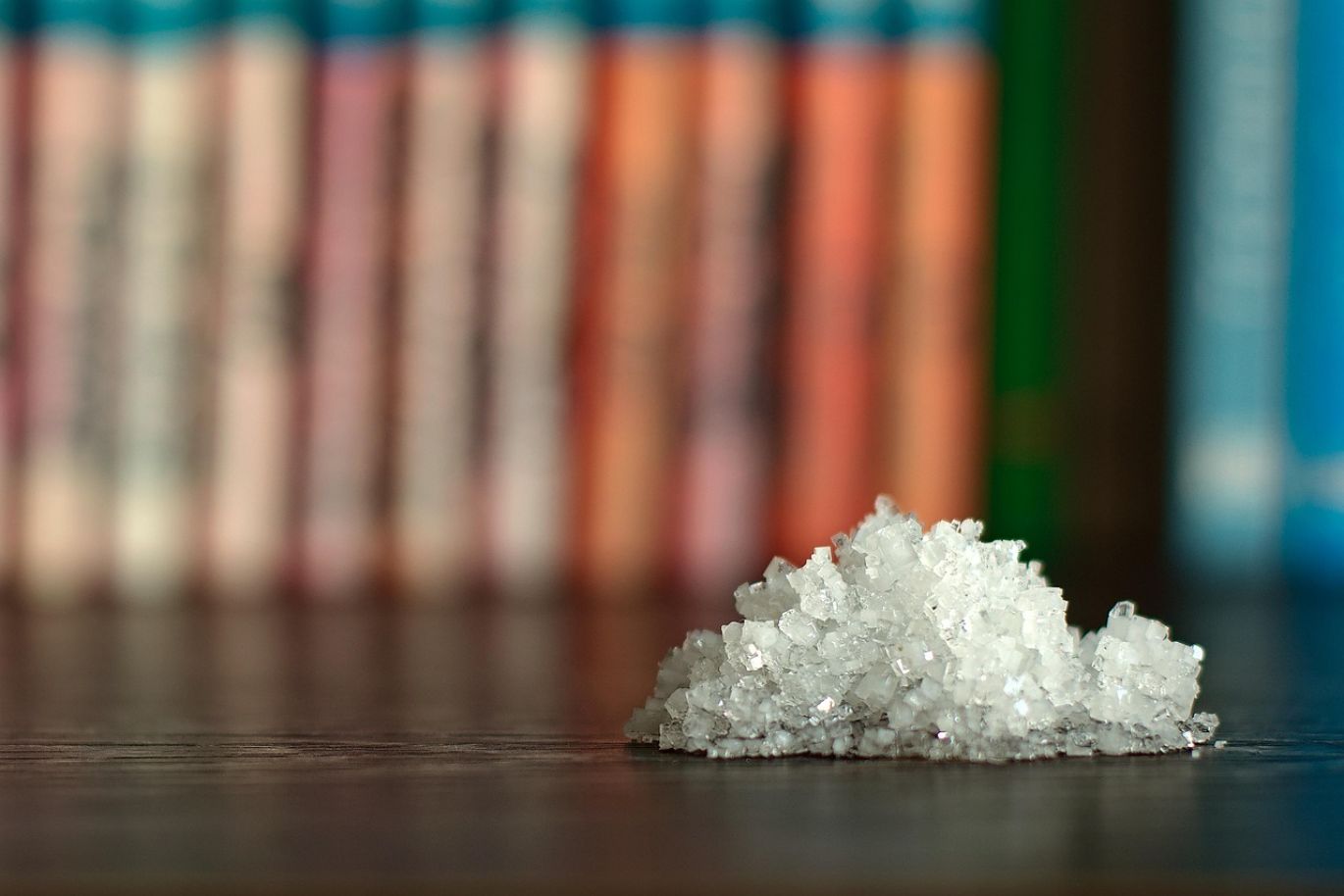 Table showing calcium chloride used in various food applications like fruits, vegetables, and cheese
