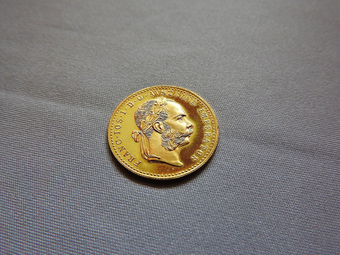 Close-up view of Canadian Mint Gold Coins showcasing their intricate details and pure gold sheen.