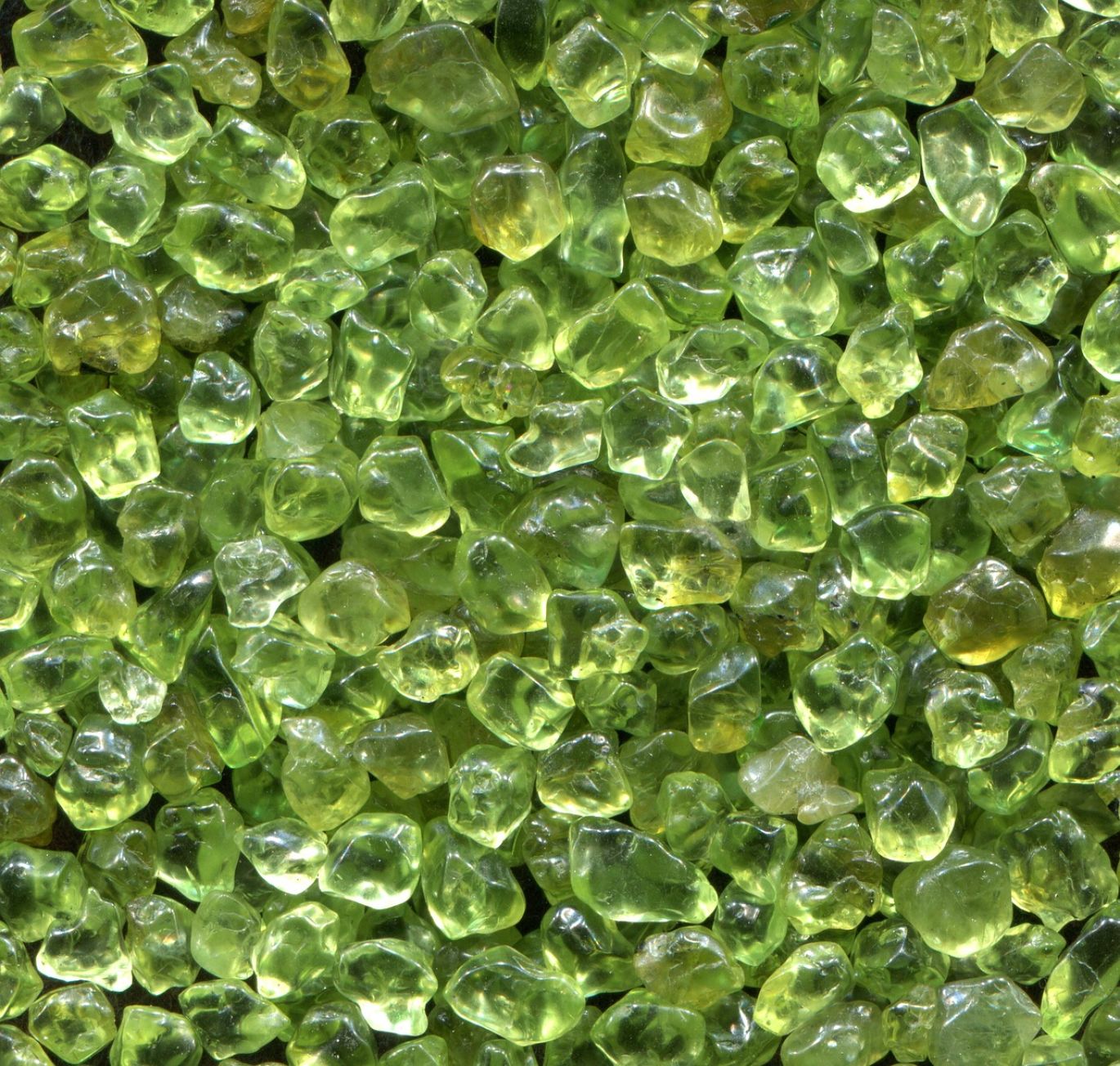 A selection of polished, high-quality gemstones including sapphires and emeralds, supplied by Summit Gold Resources.