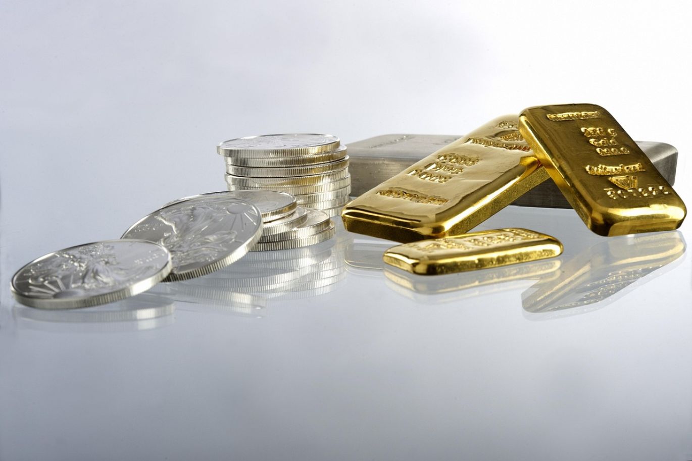 Gold and silver bars with trading chart representing Gold And Silver Futures