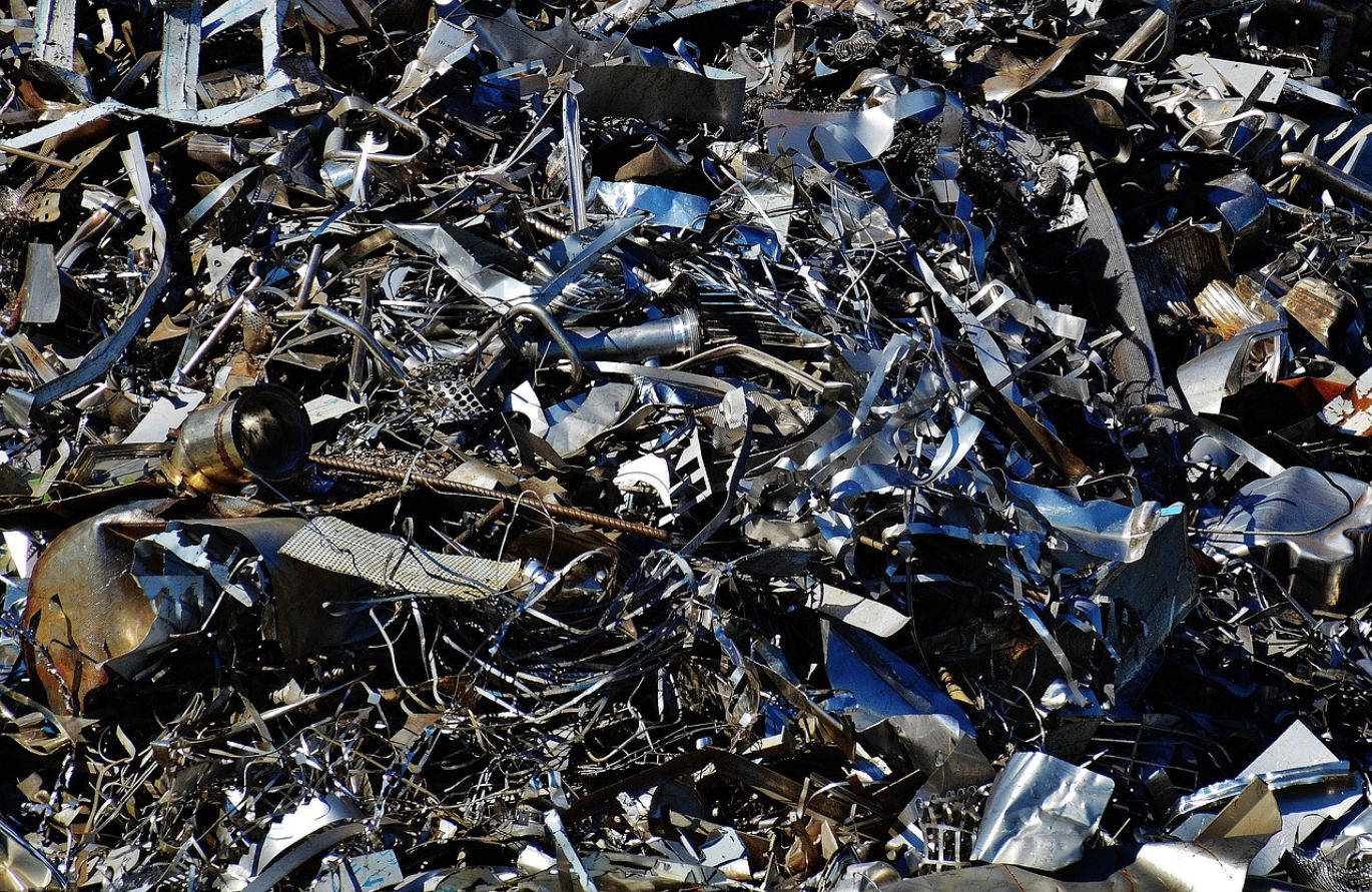 Close-up of metal scraps being processed for hidden scrap gold by Summit Gold Resources in Kenya.