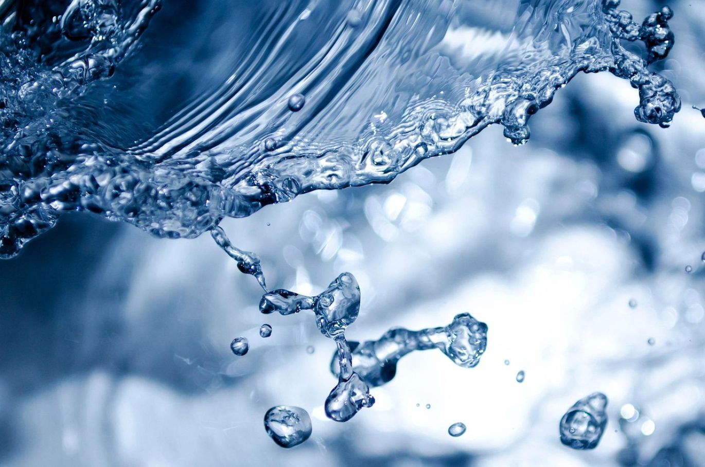Close-up of Magnesium Chloride soluble in water crystals dissolving