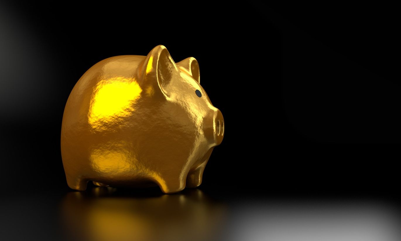 Close-up of a shiny gold coin, representing an Online Gold Coin Purchase from Summit Gold Resources.