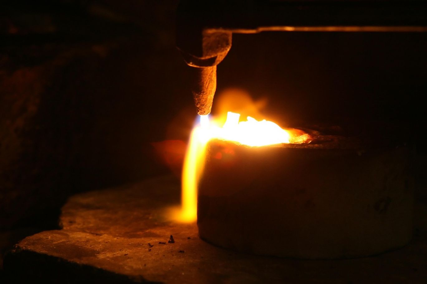 Stacks of gleaming platinum bars for sale, representing high purity and ethical sourcing from Summit Gold Resources.