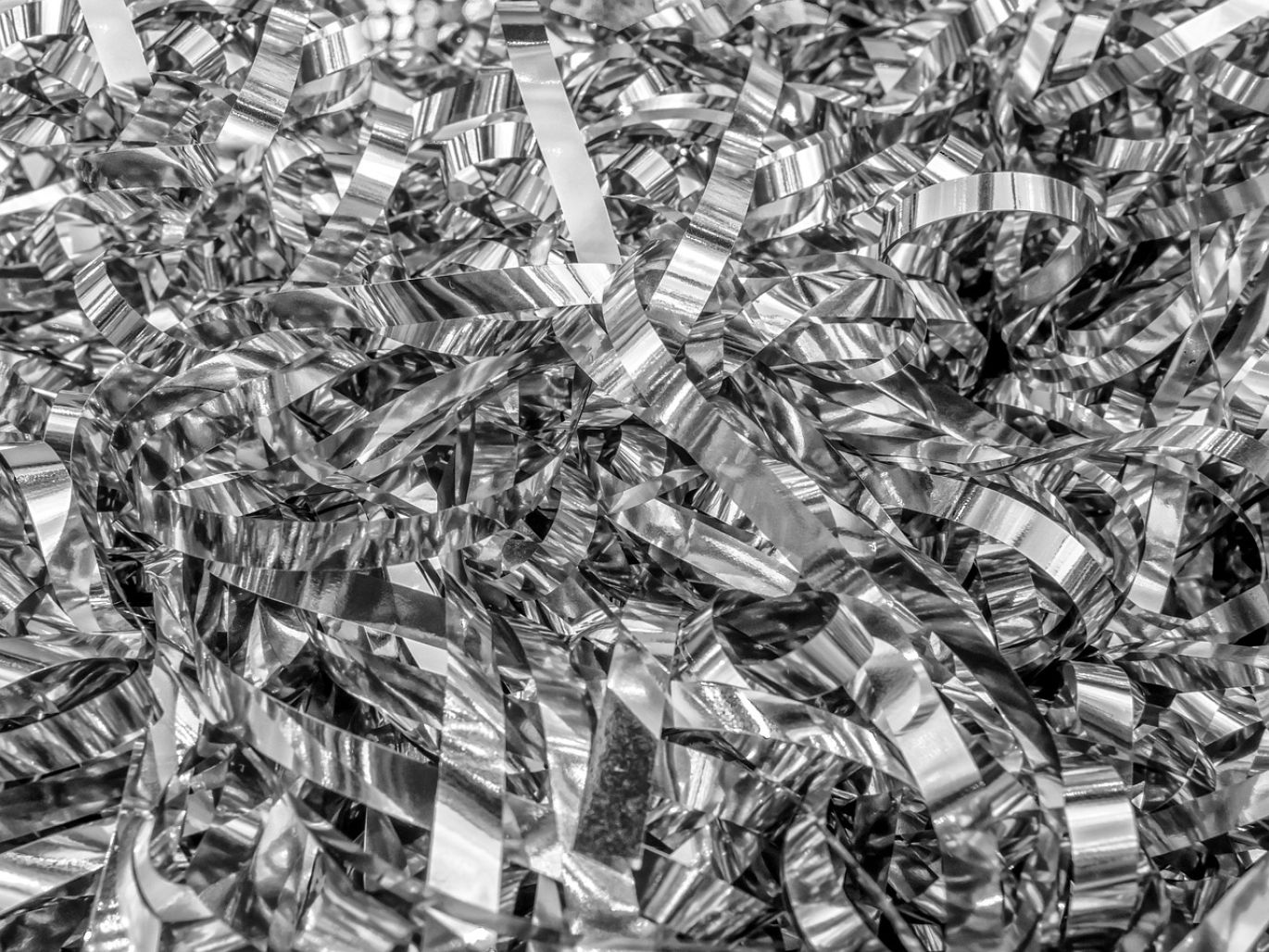 Close-up of platinum scrap metal pieces, representing the Platinum Scrap Price market.