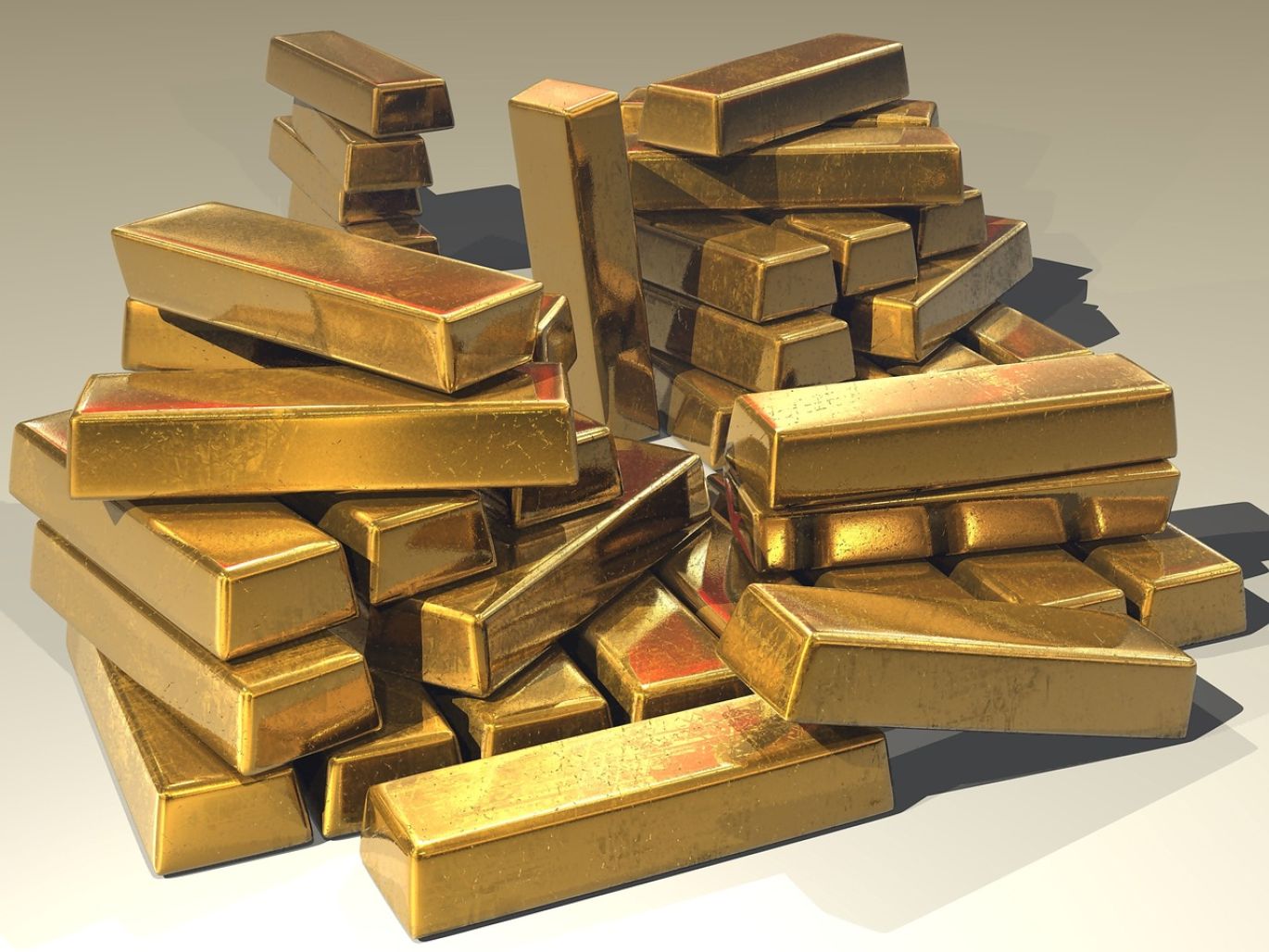 Golden, platinum, and silver bars representing Precious Metal In The World, sourced ethically.