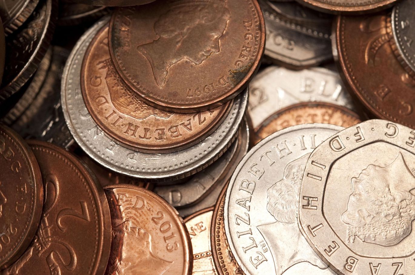 Stack of Pure Silver Bars with Summit Gold Resources logo