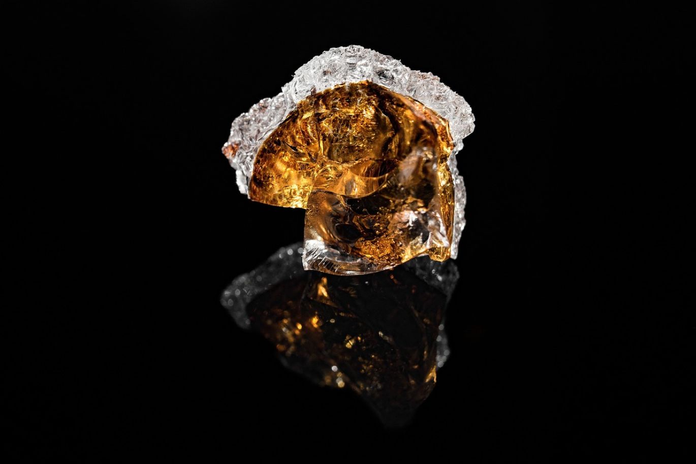 Close-up of raw gold ore being processed for Puregold Stocks by Summit Gold Resources.