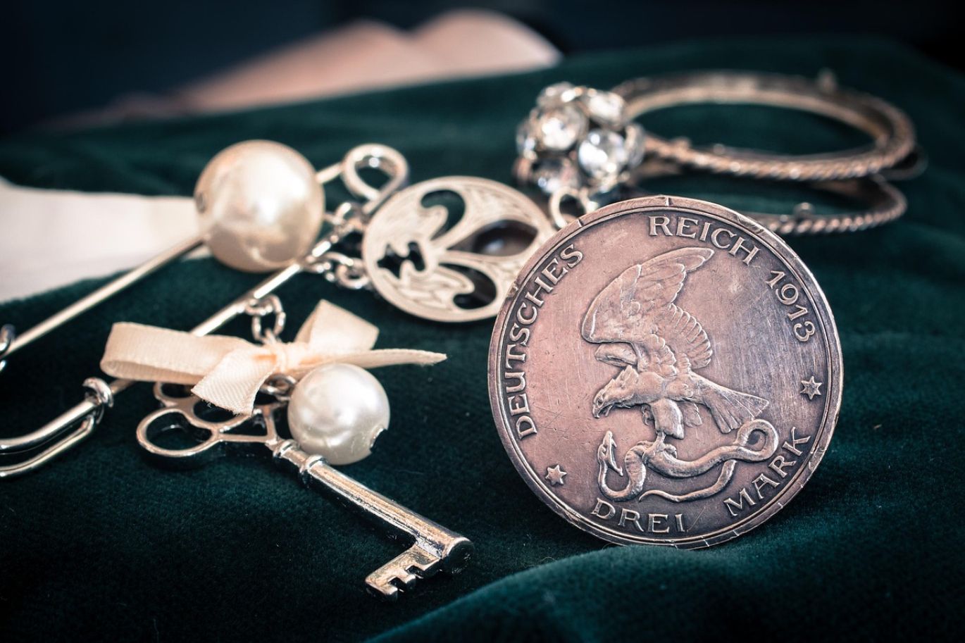 Close-up of shiny silver coins, representing a Silver Coin Shop Near Me offering from Summit Gold Resources in Kenya.
