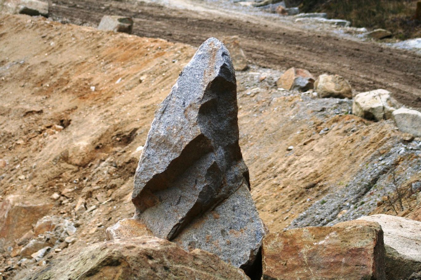 Stone Mining Meaning: Summit Gold Resources extracting valuable mineral deposits responsibly in Kenya.