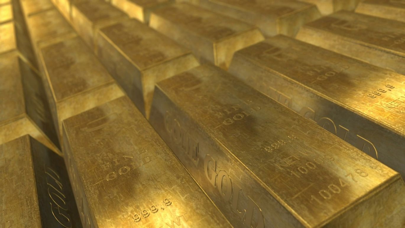Polished titanium bullion bar showing its metallic sheen, representing high-quality industrial material.