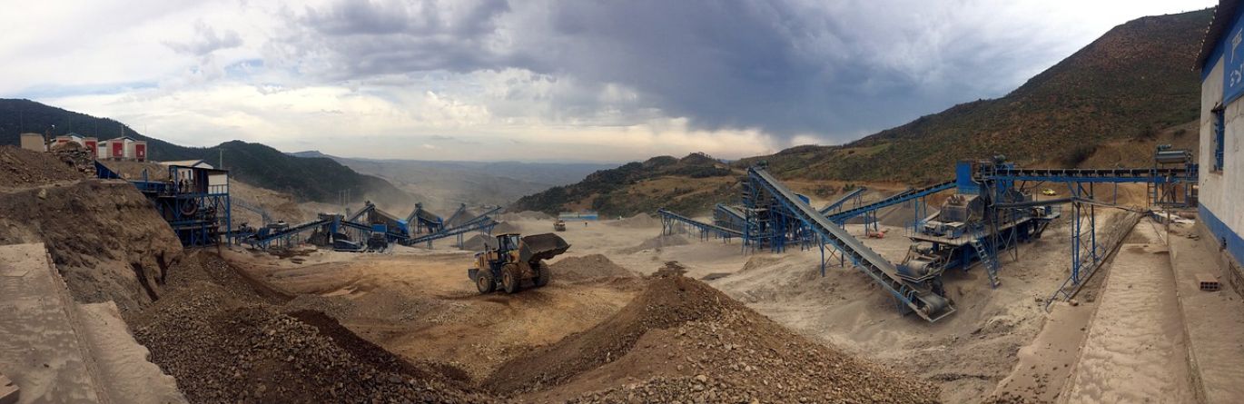 Aerial view of an underground mine facility and freeport area