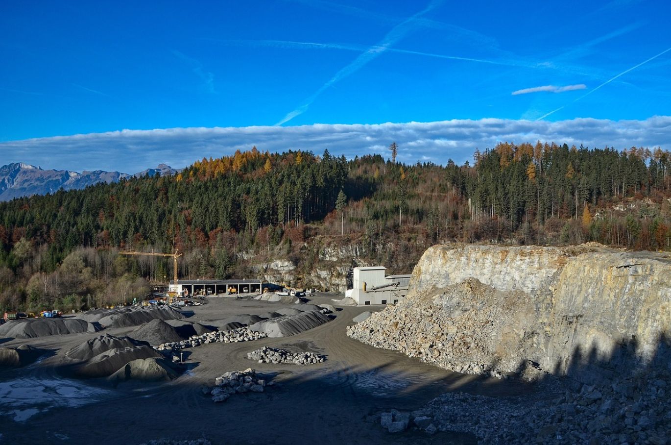 A pile of clean white silica sand at a quarry, representing White Silica Sand Suppliers provided by Summit Gold Resources in Kenya.